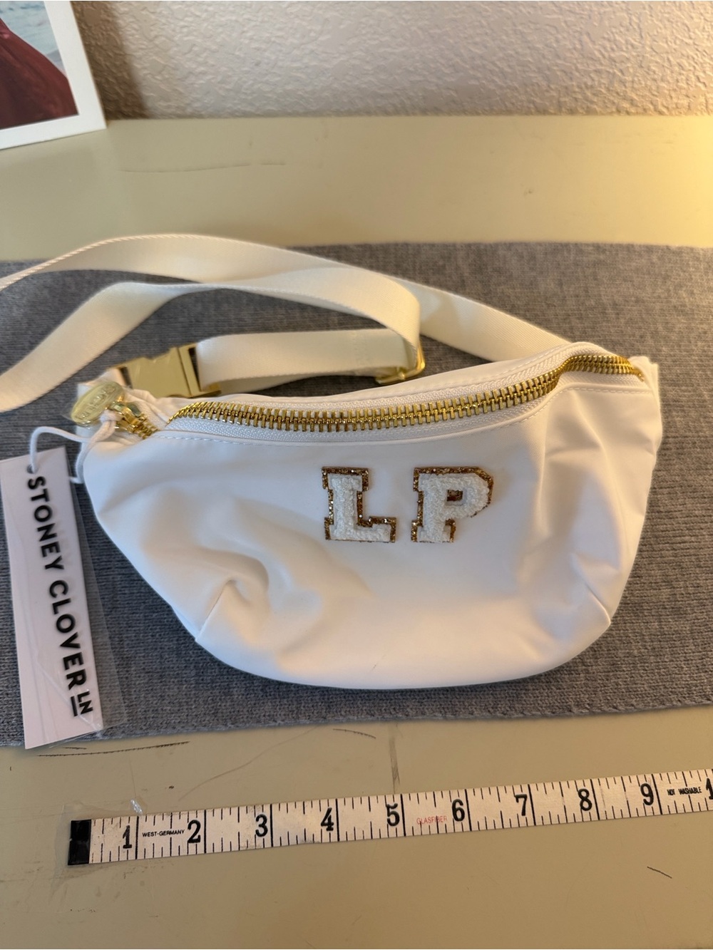 Stoney Clover Lane White Crossbody Belt Bag with Gold Trim and LP Patch